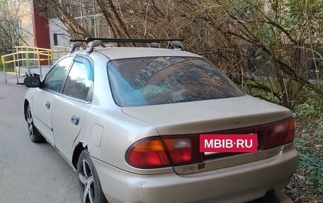 Mazda 323, 1994 год, 100 000 рублей, 2 фотография