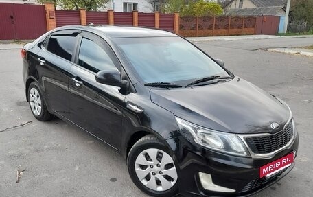 KIA Rio III рестайлинг, 2014 год, 860 000 рублей, 4 фотография