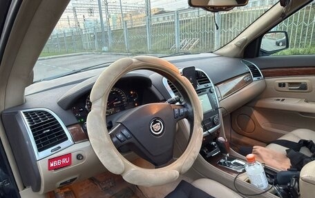 Cadillac SRX II рестайлинг, 2007 год, 500 000 рублей, 14 фотография