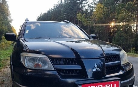 Mitsubishi Outlander III рестайлинг 3, 2004 год, 440 000 рублей, 4 фотография