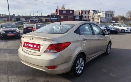 Hyundai Solaris II рестайлинг, 2011 год, 880 000 рублей, 5 фотография