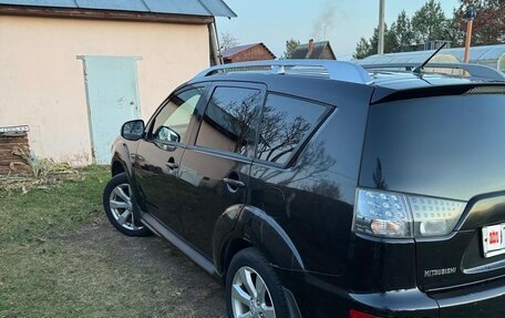 Mitsubishi Outlander III рестайлинг 3, 2010 год, 990 000 рублей, 1 фотография