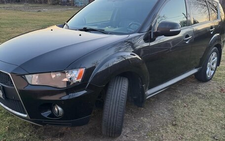 Mitsubishi Outlander III рестайлинг 3, 2010 год, 990 000 рублей, 3 фотография