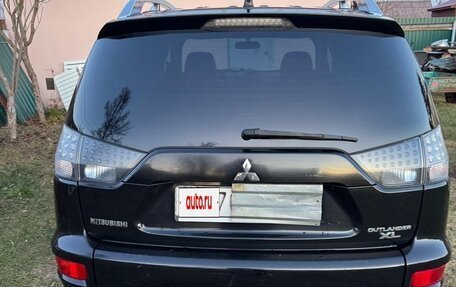 Mitsubishi Outlander III рестайлинг 3, 2010 год, 990 000 рублей, 5 фотография