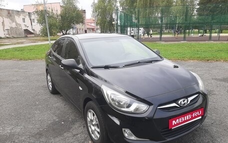 Hyundai Solaris II рестайлинг, 2011 год, 490 000 рублей, 3 фотография
