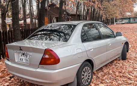 Mitsubishi Mirage VI рестайлинг, 1998 год, 215 000 рублей, 5 фотография