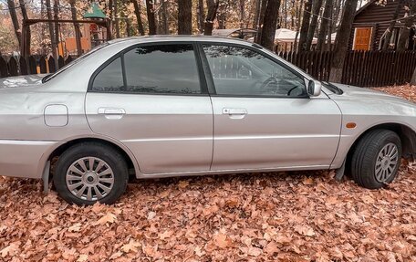 Mitsubishi Mirage VI рестайлинг, 1998 год, 215 000 рублей, 6 фотография